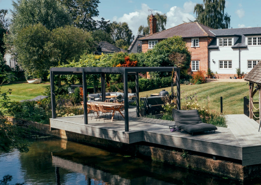 Luxe pergola beside a lake