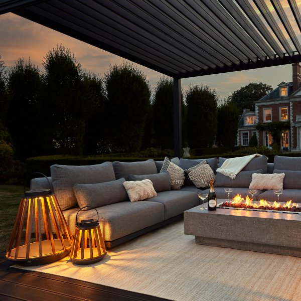 outdoor area with firepit and lanterns from suns lifestyle